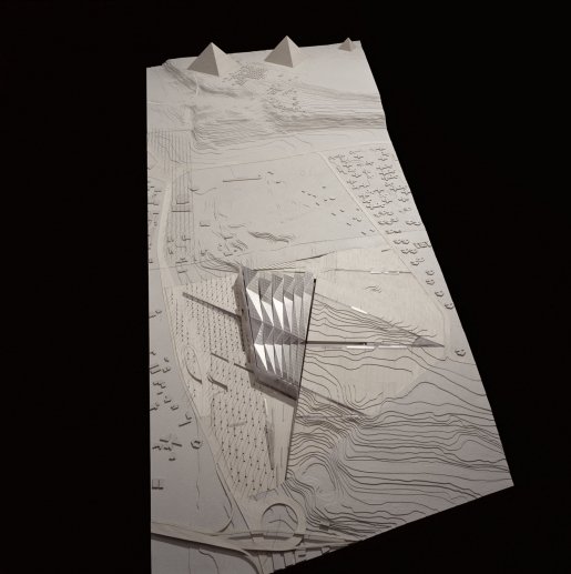 A scale model of the Grand Egyptian Museum (GEM) represents the vast architectural complex currently under development on the Giza Plateau, near the Pyramids of Khufu, Khafre, and Menkaure.