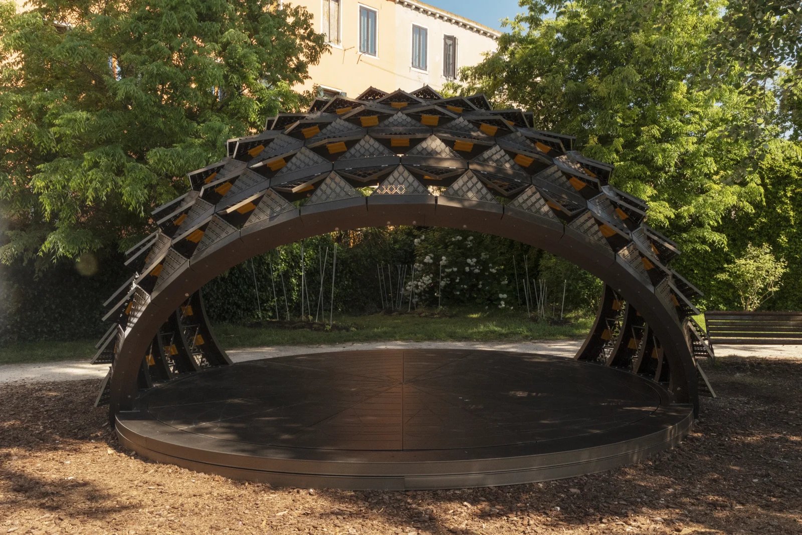SOMBRA pavilion, a structure that behaves like a dynamic heliodon, orienting its surfaces in response to sunlight through a system of passive activation.